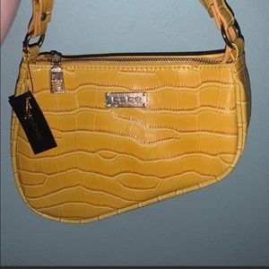 Yellow BeBe saddle bag